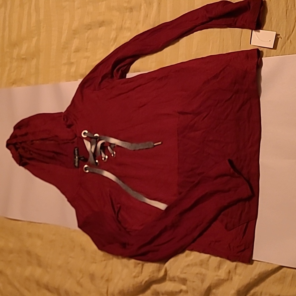 Girls size small hooded shirt. Lightweight